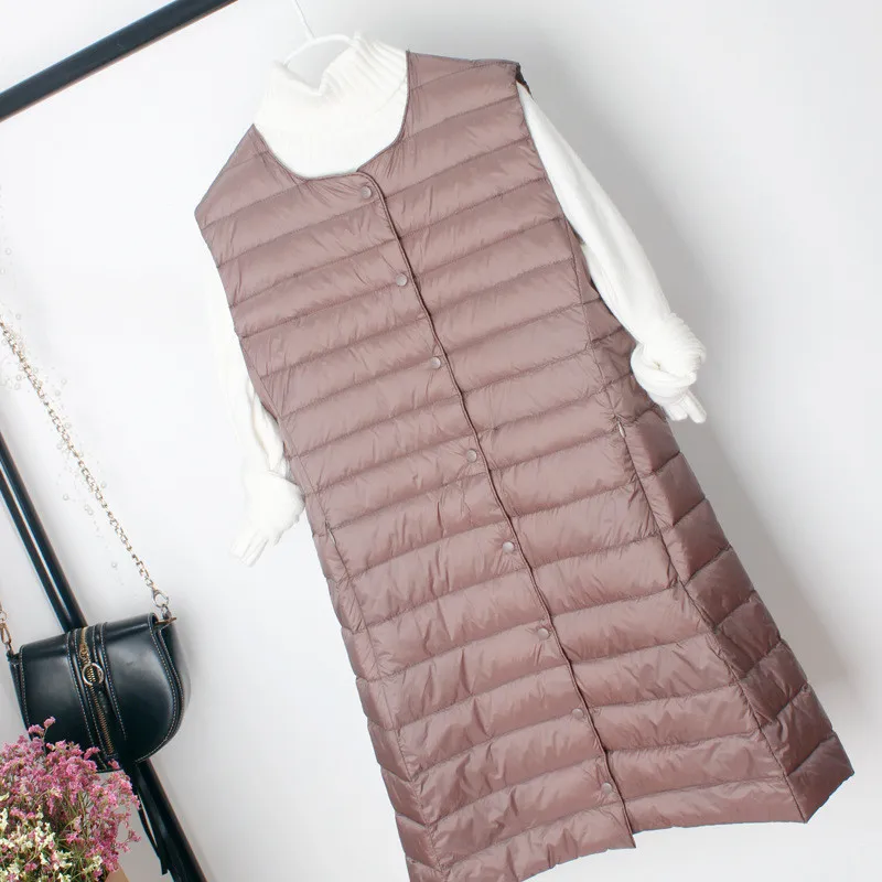 سترة نسائية لخريف وشتاء 2025 خفيفة للغاية بيضاء مبطنة للأسفل سترة نسائية طويلة أسفل صدرية معطف بدون أكمام ملابس خارجية سترات