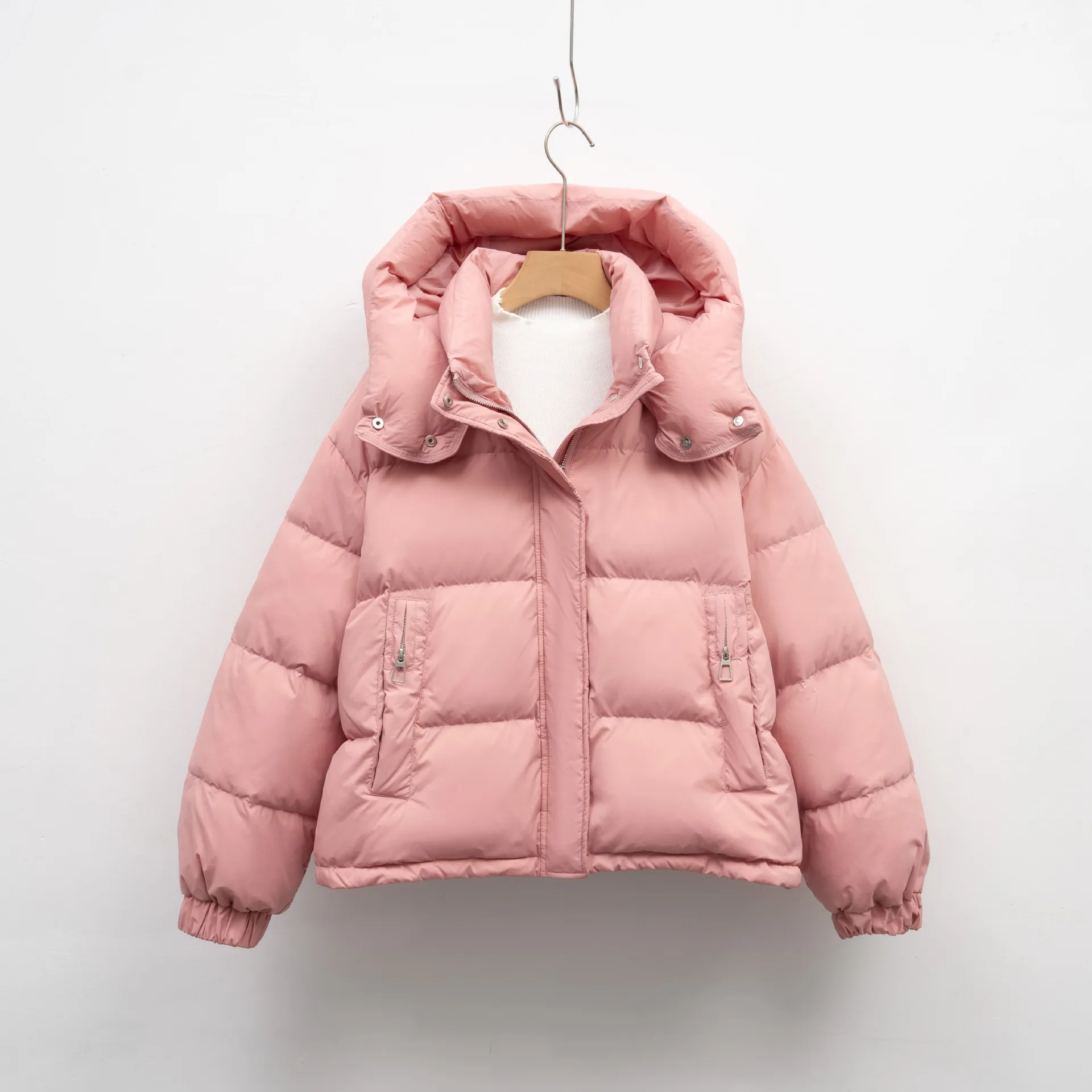 

Petite-friendly puffer. Designed with a cropped, puffy silhouette and hood to elevate your style and keep you cozy.