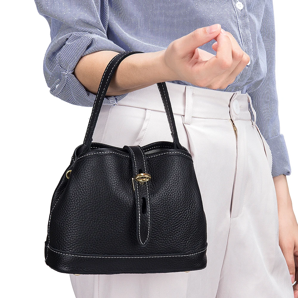 

The new leather handbag high-capacity portable package ins small bucket senior feeling one shoulder his female bag