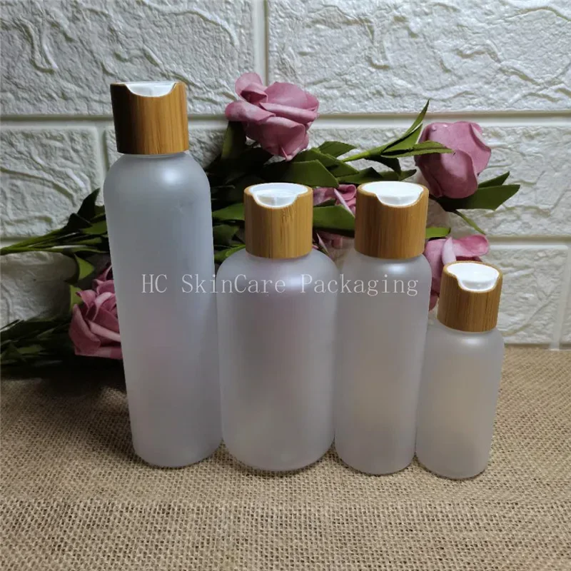 

Empty Transparent Plastic Cosmetics Lotion Bottle With wooden Bamboo Disc Screw Lid Shampoo PET Containers Packaging bottle
