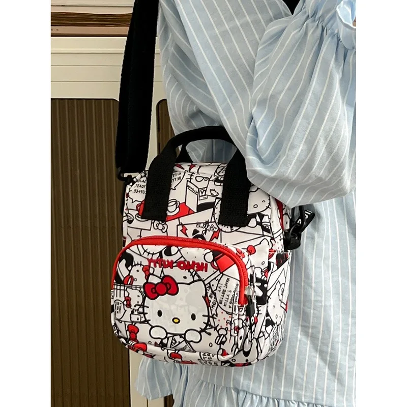 MBTI Hello Kitty torba na ramię damska mała styl japoński moda nadruk kreskówkowy torba Crossbody nylonowa śliczna damska torebka na monety