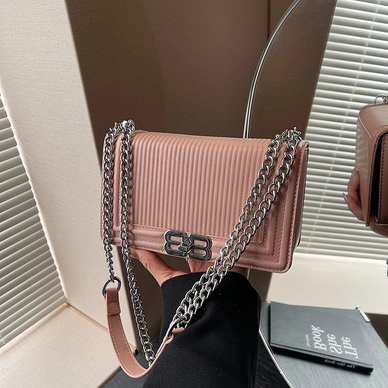 

Modern Vintage Inspired Crossbody Bag - High-Quality Textured Leather Minimalist Design With Chic Parisian Letter Logo