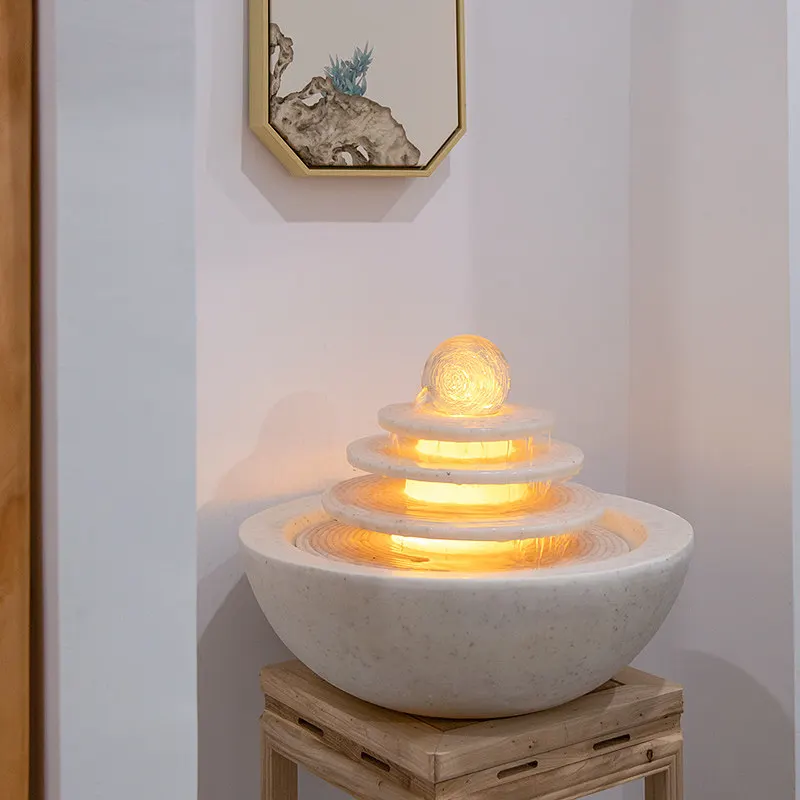 flowing water ornament, circulating water, modern light luxury living room, rockery fountain
