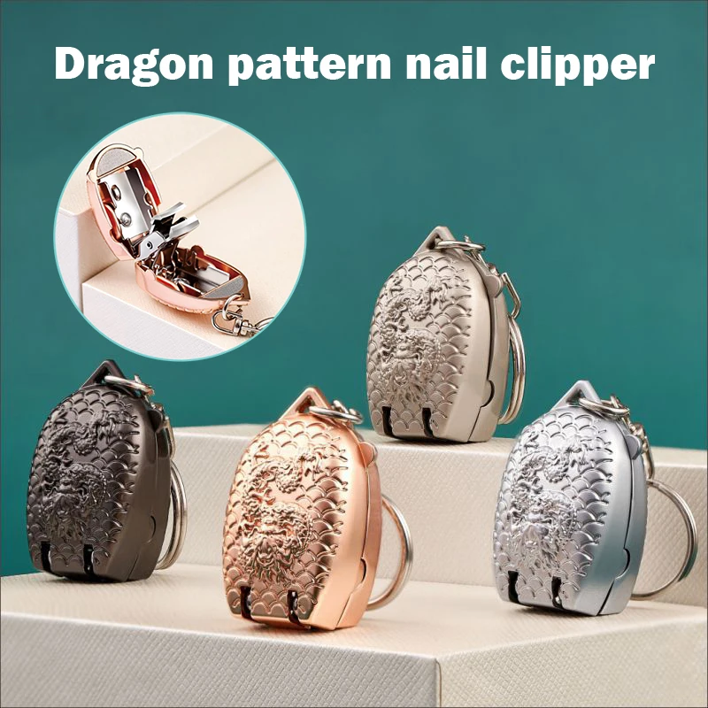 Een nieuwe zilveren zwarte gouden draakpatroon mini volledig stalen opvouwbare nagelknipper reis draagbare nagelknipper met sleutelhanger manicure