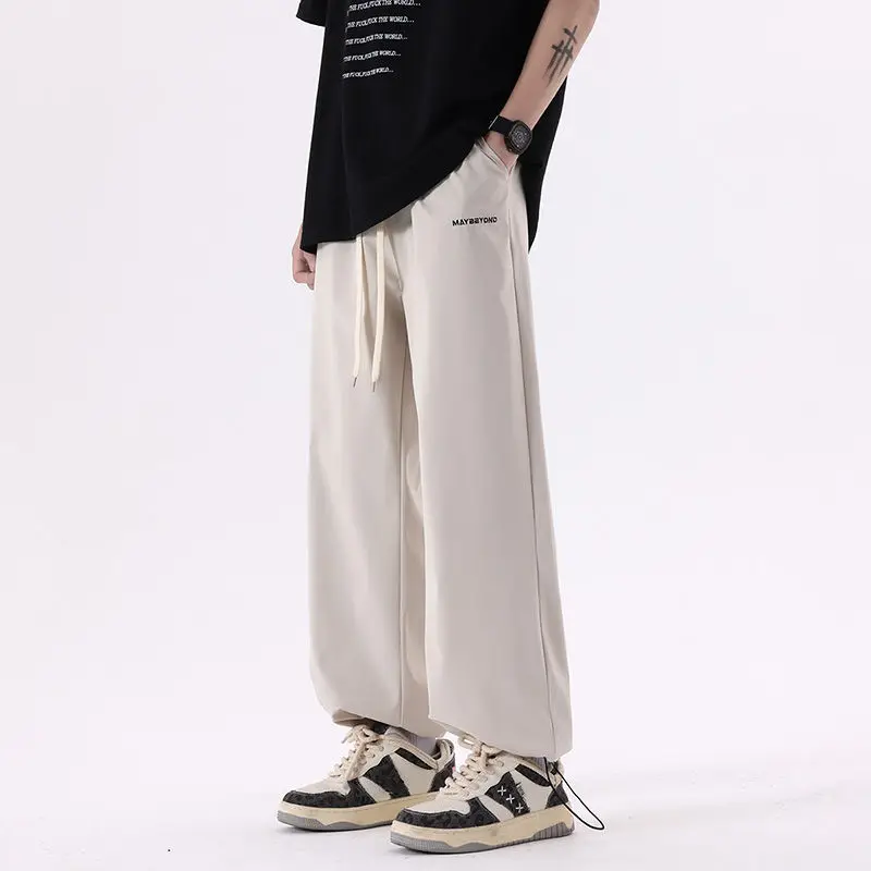 

Youthful Vitality Summer New Casual Pants Men's Solid Elastic Waist Drawstring Pockets Fashion Loose Bound Feet Wide Leg Trouser