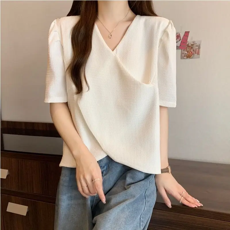 Odzież damska koreańska elegancka słodka Kawaii asymetryczny Design koszulka letnia z krótkim rękawem jednolite, luźne Y2K Streetwear topy