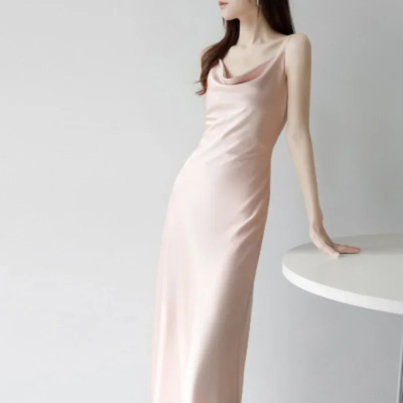 2025 الصيف المرأة الجديدة فستان بحزام مثير موضة الإنترنت المشاهير أسفل حقيبة الورك فستان طويل الأوروبية والأمريكية ألف خط تنورة