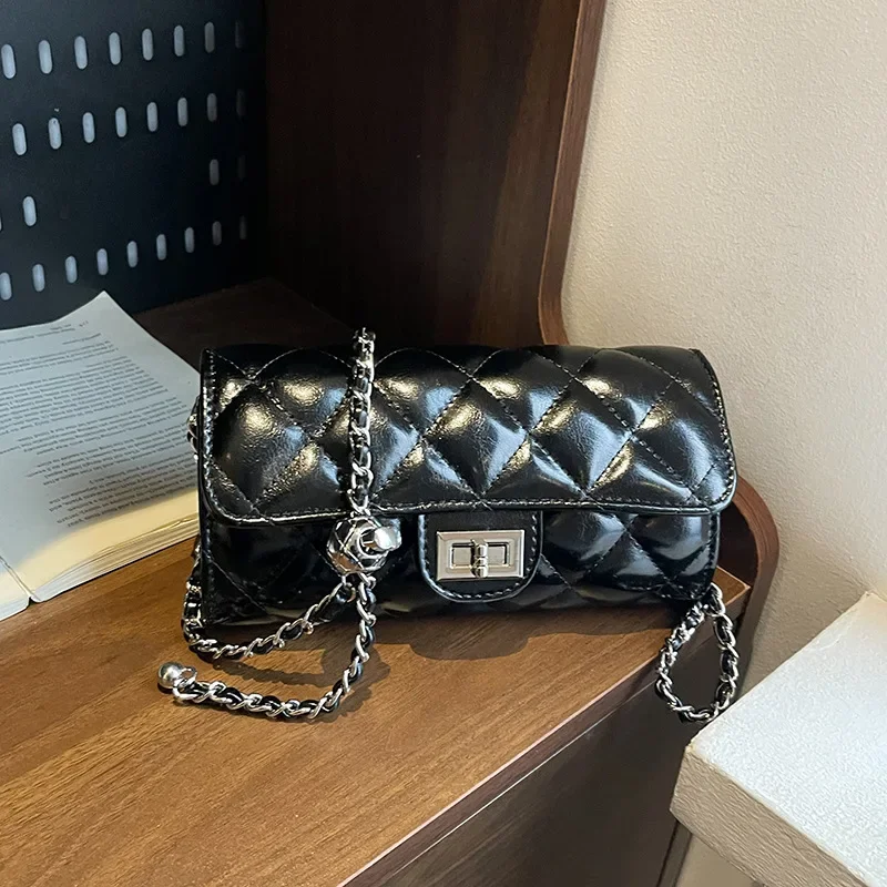 

Crossbody bag women's bag 2025 new super fire silver rhombus chain bag high sense niche versatile cylinder mobile phone bag