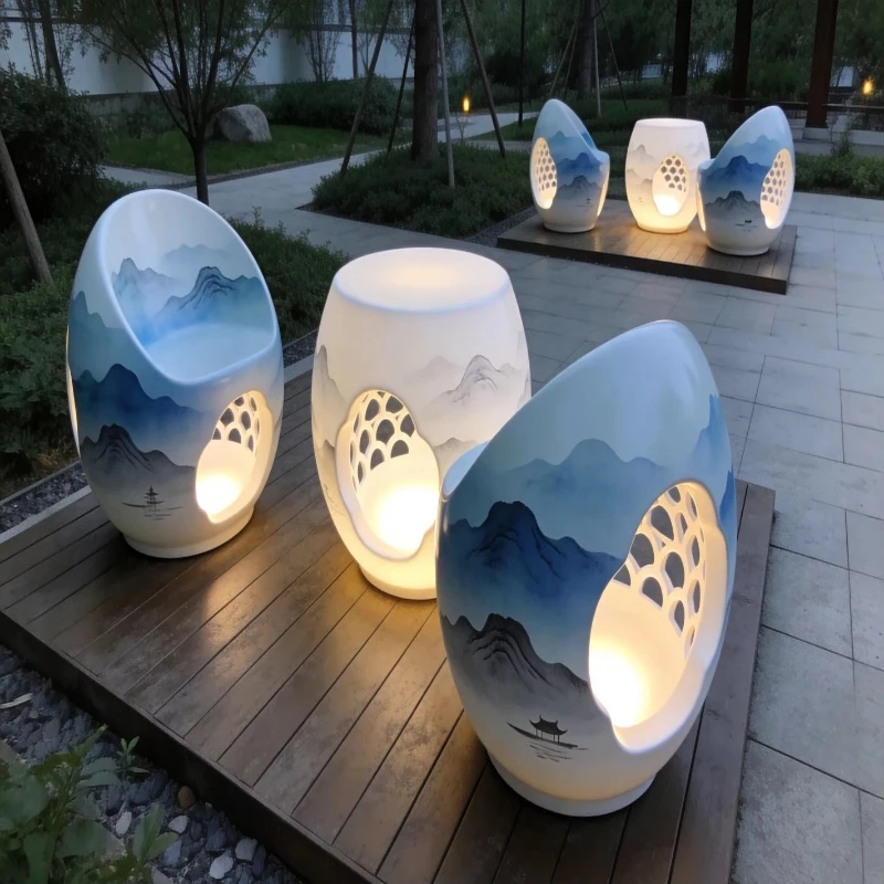 Artistic new Chinese outdoor dining table set, luminous gradual change blue and white resin furniture with mountain pattern