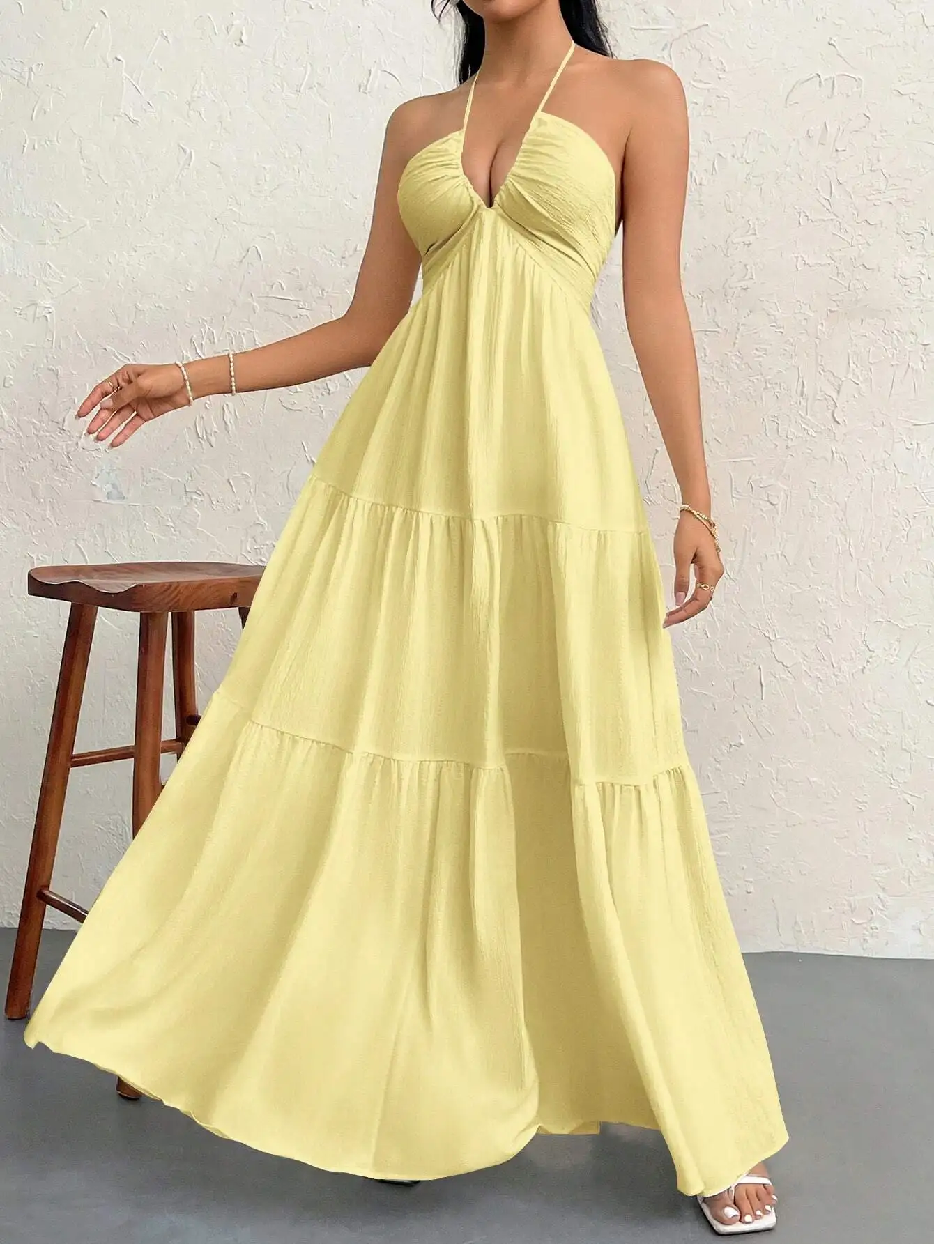 

Pastel Yellow Chiffon Halter Neck Tiered Maxi Dress With Backless Tie-Up Detail For Vacation And Special Occasions
