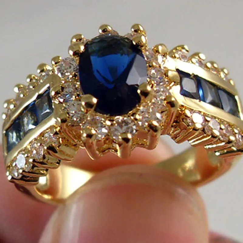 2024 new Luxurious Blue Red Zircon Fashion Men\'s and Women\'s Rings Gold Color Anniversary Unisex Jewelry Wedding Rings Wholesale