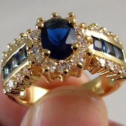 2024 new Luxurious Blue Red Zircon Fashion Men's and Women's Rings Gold Color Anniversary Unisex Jewelry Wedding Rings Wholesale