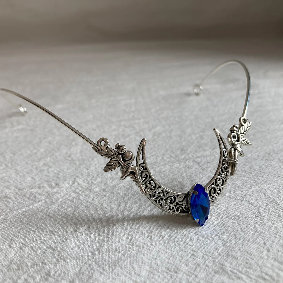 ที่คาดผมประดับพลอยเทียมรูปนางฟ้าเอลฟ์สำหรับงานแต่งงานมงกุฎเจ้าสาวสีเงินมงกุฏฮาโลเครื่องประดับนางฟ้างานเลี้ยงคอสเพลย์สำหรับผู้หญิง