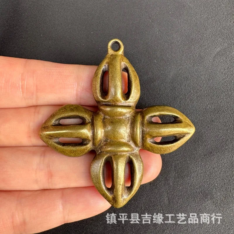 Tibetan-style brass cross vajra pendant