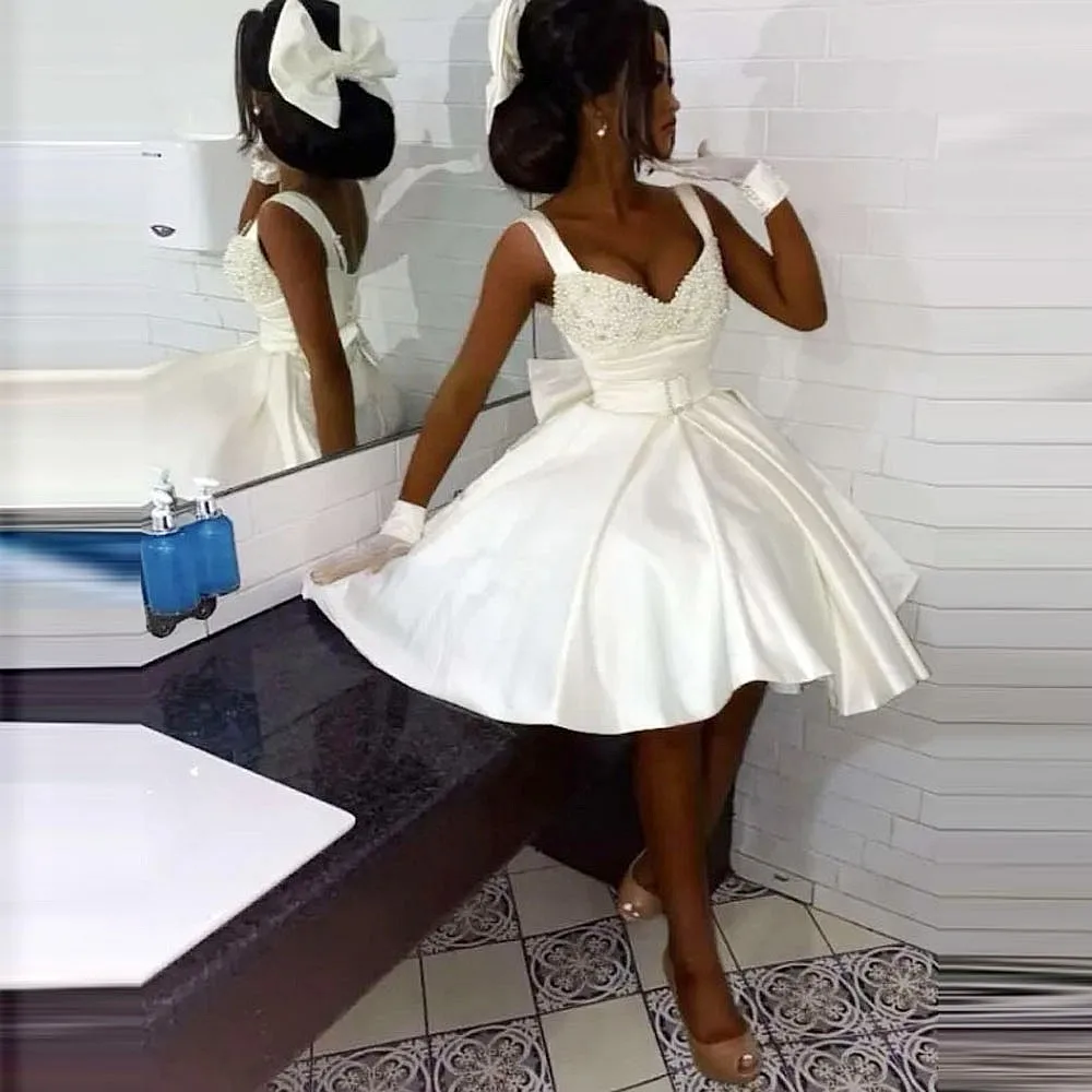 

Коктейльные платья цвета слоновой кости с жемчугом и бусинами на бретельках сзади с бантом Атласное вечернее платье длиной до колена Вечерние платья трапециевидной формы для девочек на день рождения