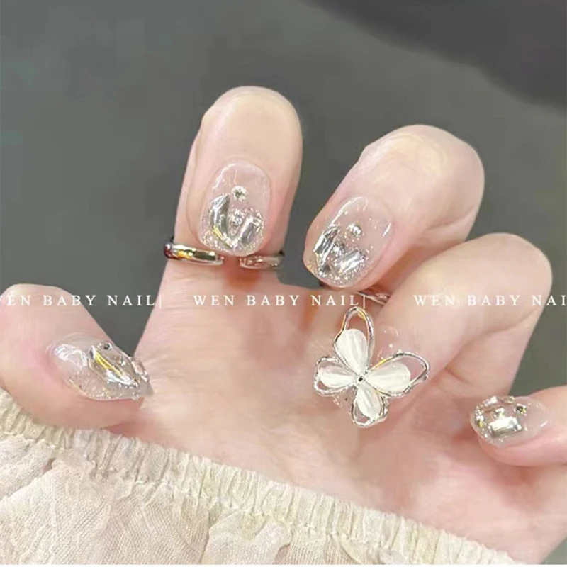 10Pcs 3D Cat Eye Butterfly Nail Art Charms Rhinestones Metal Ice Transparent Luksusowa biżuteria Motyle Akcesoria do dekoracji paznokci*