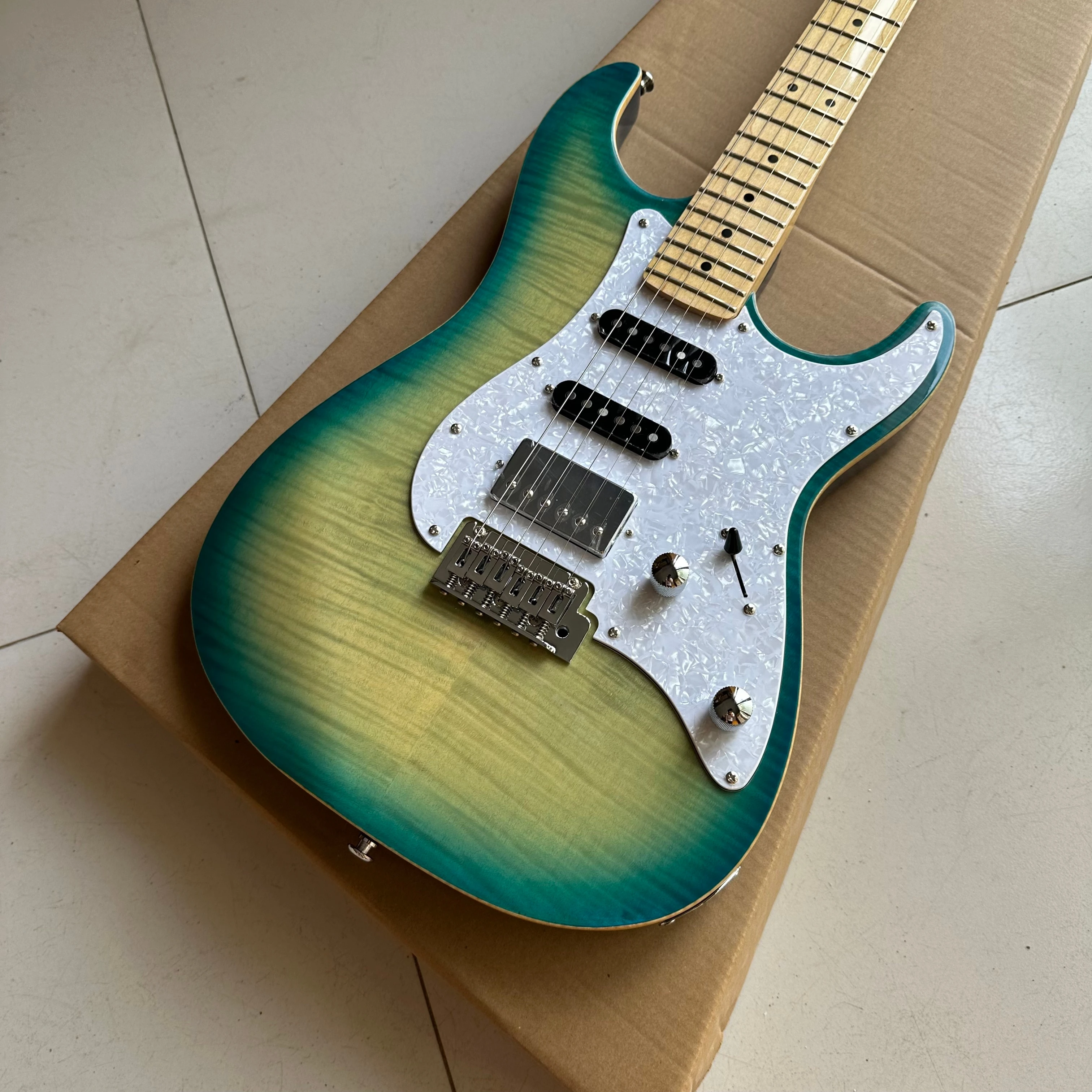 Green circle yellow electric guitar,maple fingerboard, Pearl guard