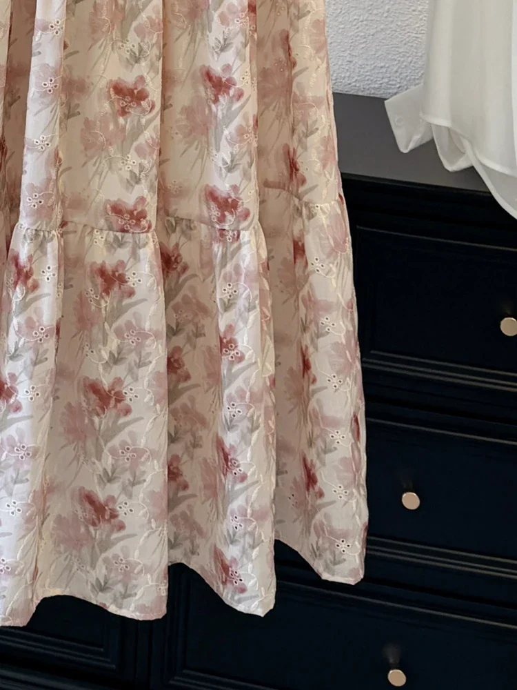Retro spódnica w kwiaty dla kobiet 2025 letnia nowa moda słodka spódnica trapezowa Temperament długa spódnica w pasie