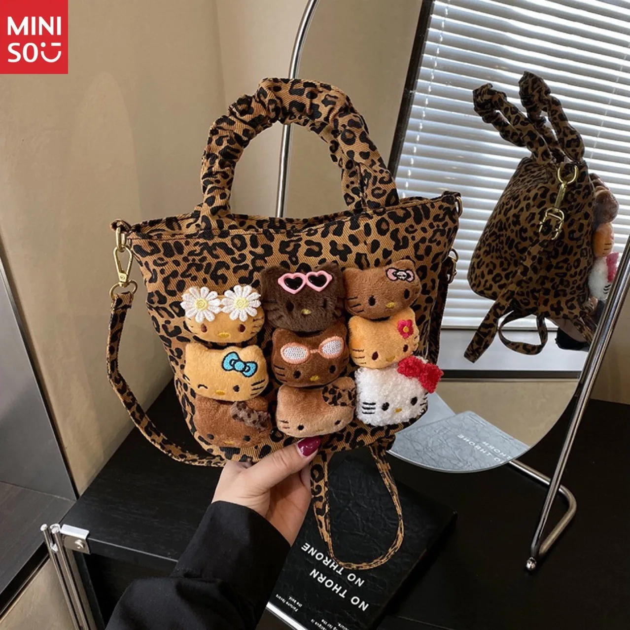 Miniso 2025 Black Hello Kitty Tote Bag, Canvas Bucket Purse with Leopard Print & Plush Toy