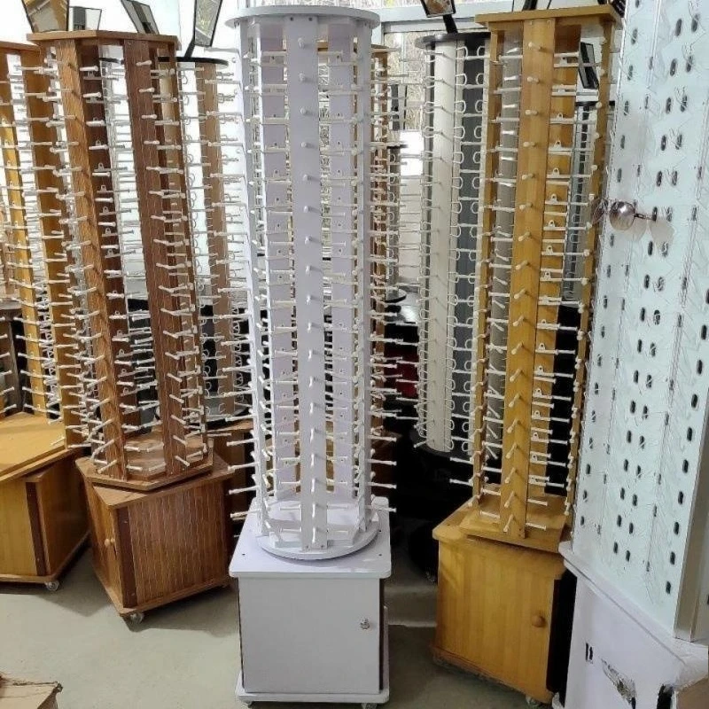 

Floor-to-ceiling mobile sunglasses shelf display stand props
