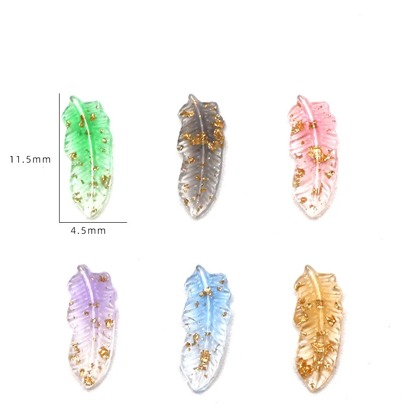 Nowe zdobienia paznokci 50 szt. Rozdrobnione złote piórka akcesoria do paznokci gradientowe liście świecące w ciemności ozdoba do paznokci żywiczne amulety do paznokci