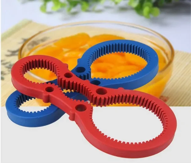 

Multifunctional 8 Decapsulation Screw Cap Jar Bottle Wrench Gourd Shaped Tinopener Bottle Opener Kitchen Accessories KW 032