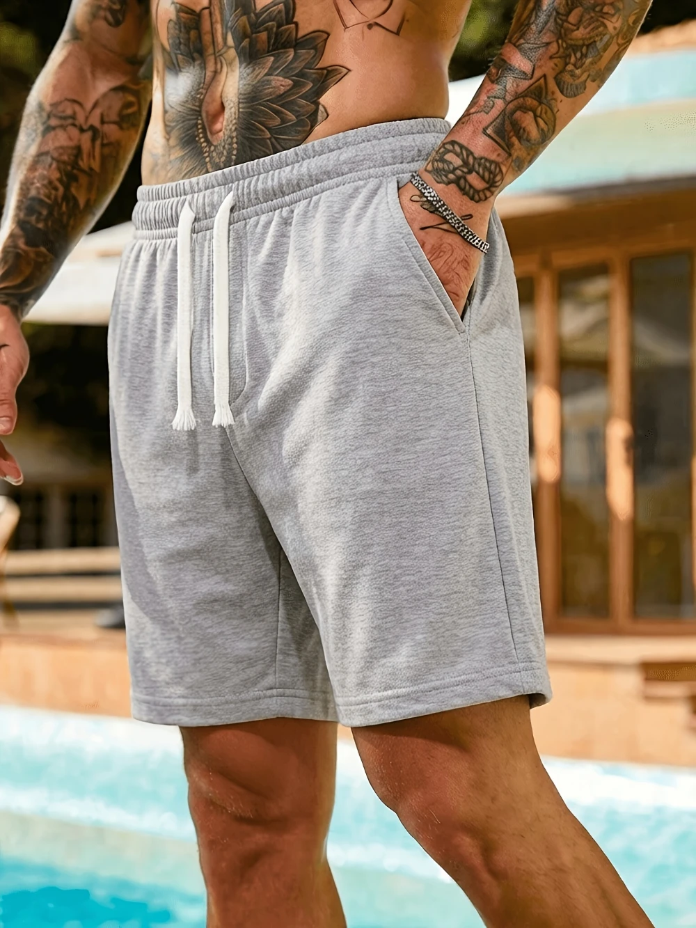 Shorts esportivos casuais masculinos respiráveis com cordão e bolsos, perfeitos para atividades ao ar livre na praia no verão e uso diário.