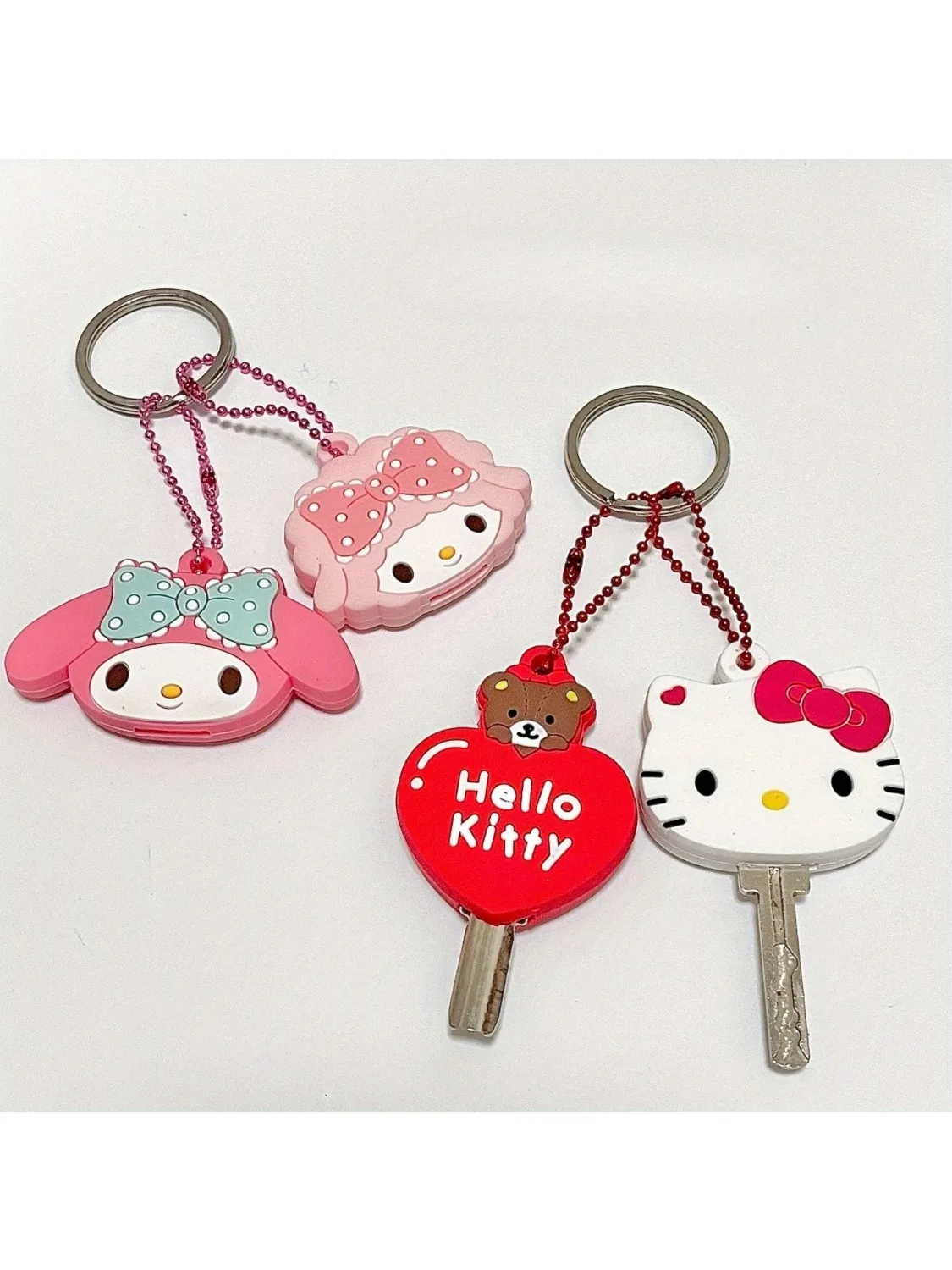 Kawaii Sanrio Hello Kitty Silicone clé Anti-poussière housse de protection dessin animé ma mélodie Portable Anti-perte porte-clés filles cadeau