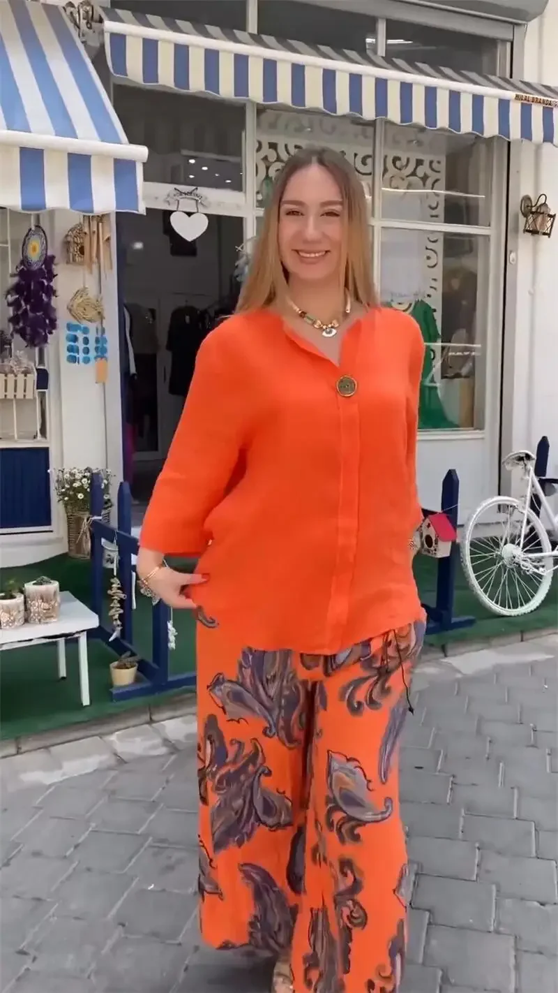 Set di pantaloni da donna in due pezzi Set di pantaloni larghi Casual a maniche lunghe top elegante stampa giuntura pantaloni lunghi a gamba larga elastico in vita autunno