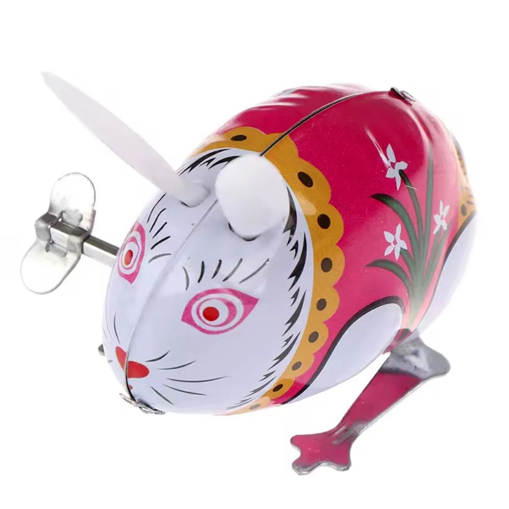 Dies ist ein klassisches Frühlingssprung-Kinderspielzeug aus Eisenkaninchen, Actionspuppen-Kinderspielzeug und ein klassisches Frühlingsspielzeug für Kinder als Geschenk