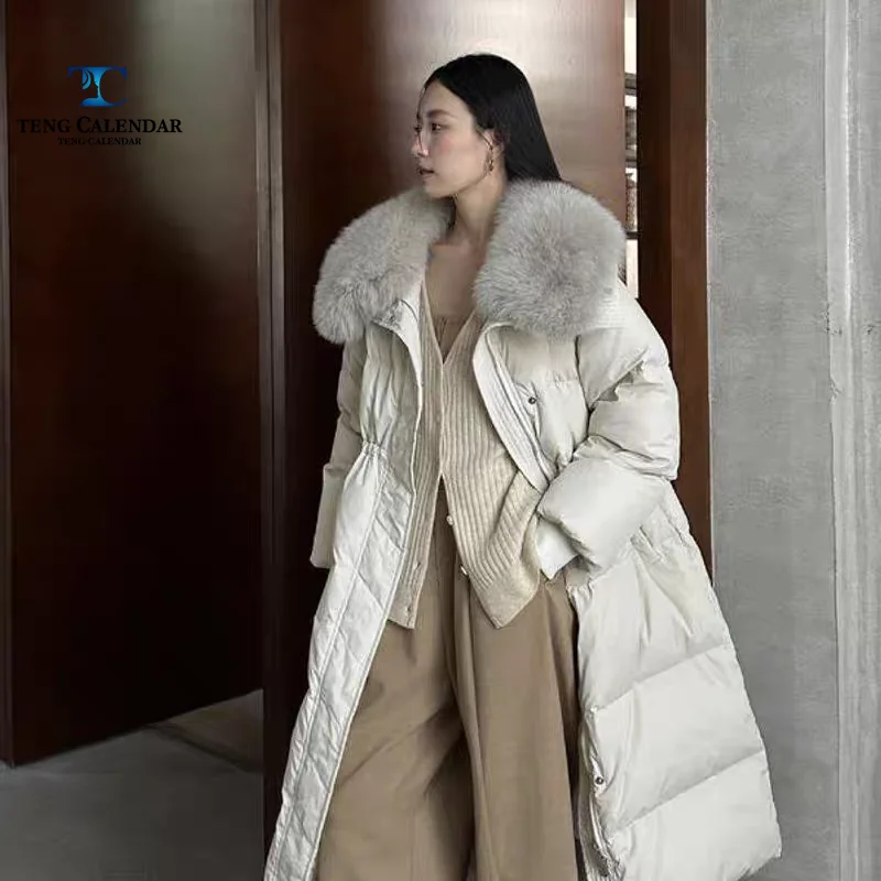 

Пуховик с лисьим меховым воротником, корейская версия, свободная куртка большого размера с длинным шнурком на талии, женская новая зимняя версия 2025 года