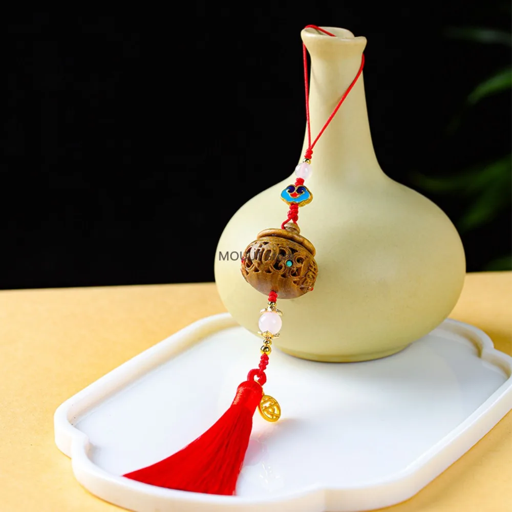 

Green Ebony Wood Hollow Out Engraved Miniatures Incense Bag Portable Perfume Pendant Mobile Phone Decorative Wooden Accessorie