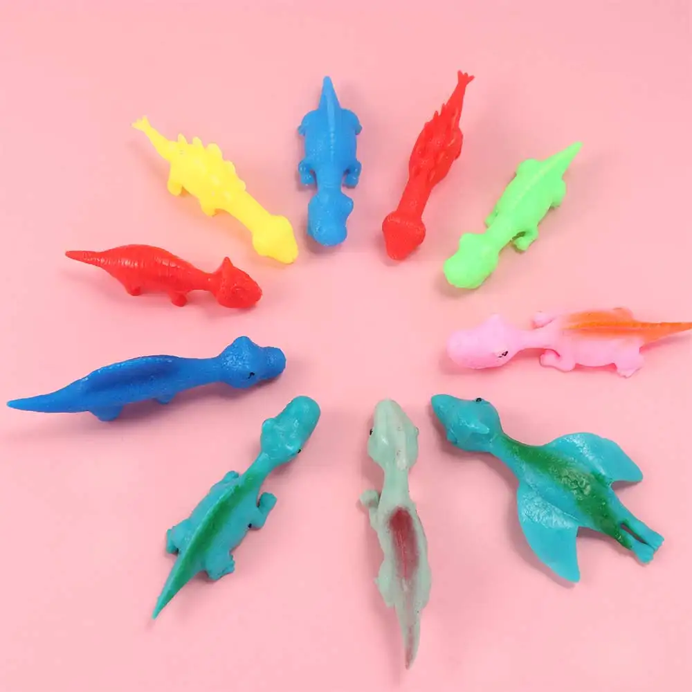 5pcs Plastic Launch Dinosaur Dinosaur Elastic Finger Ejection Dinosaur Sticky Funny Flying Dinosaur Finger Toys Party Decoration