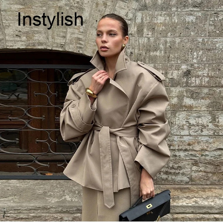 

Spring and Autumn women's clothing features a stylish lapel, short, cinched-waist, lace-up trench coat with a British style