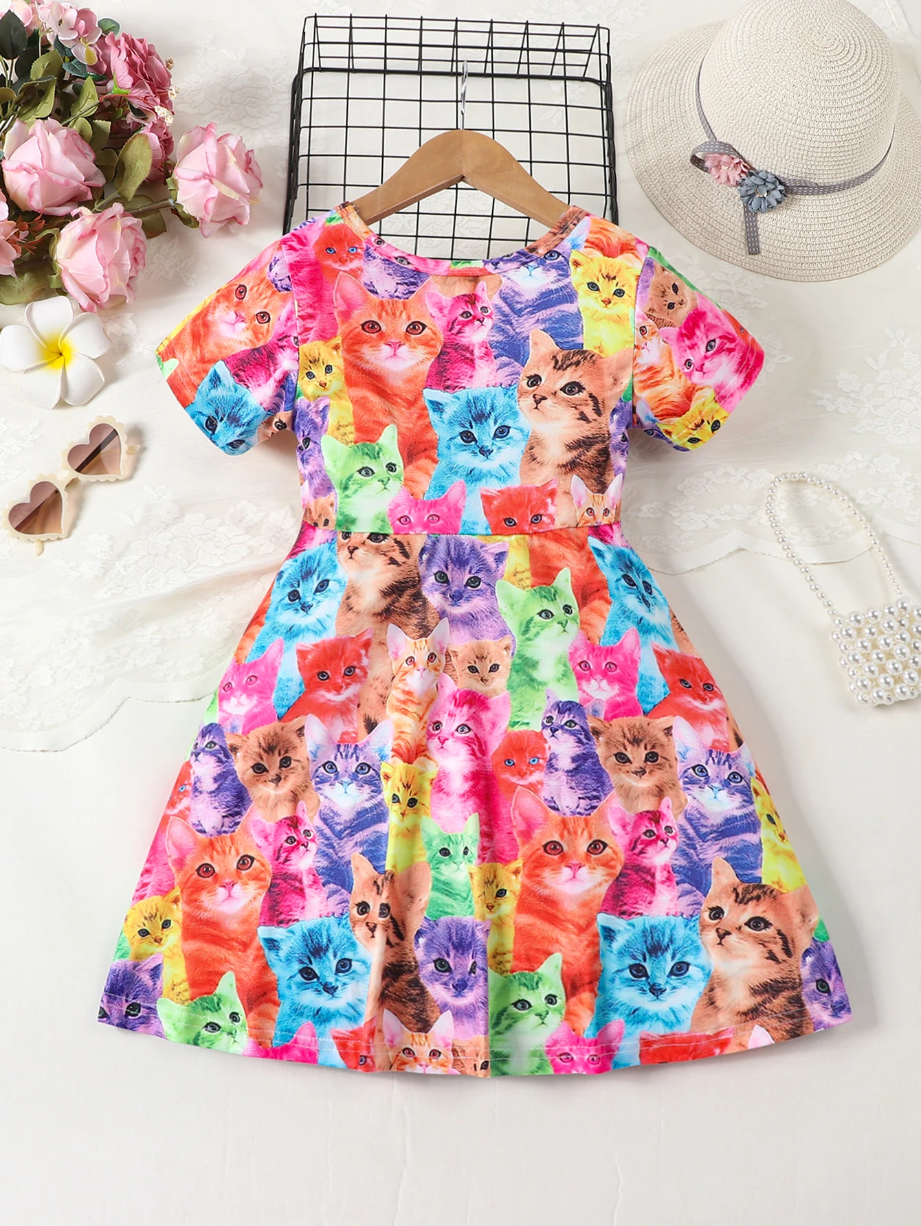 Cute and fashionable multi colored cat printed round neck short sleeved waist casual dress for girls