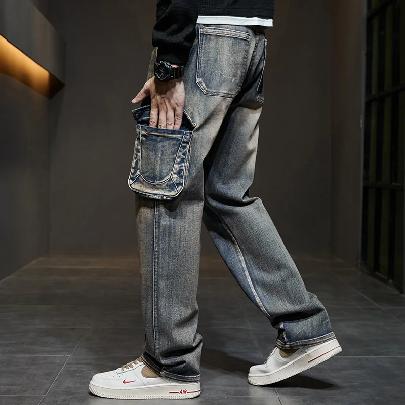 men's yellow mud pocket work jeans New autumn and winter models Straight loose fashionable high-end jeans men's trousers