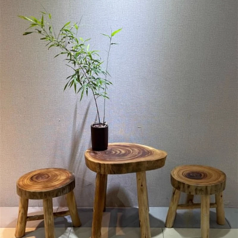 

wooden pile bedside table, a few changes of shoes, household chairs, stools