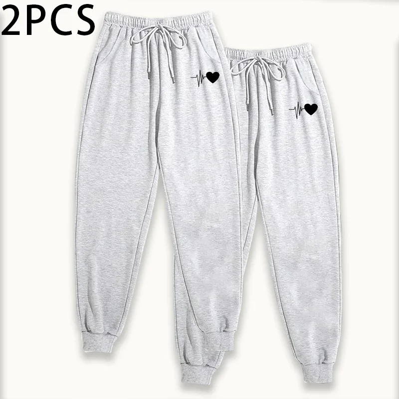 Calça de moletom feminina com estampa de coração, 2 pacotes, cor pura, outono inverno, roupa de salão, ajuste confortável, calças casuais atléticas, conjunto de 2 peças