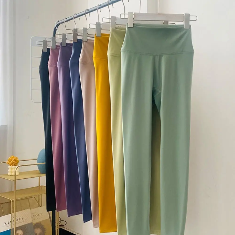 Pantaloni da yoga color crema da palestra Pantaloni da fitness per sollevamento fianchi a vita alta Pantaloni corti per esercizi elasticizzati ad asciugatura rapida Fitness