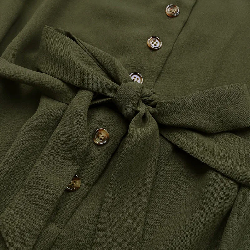 จั๊มสูทขาสั้นสีเขียวเข้มแบบเรียบง่าย แขนกุด ปกคอปก แฟชั่นใหม่สไตล์อเมริกันยุโรปสำหรับผู้หญิง ปี 2025