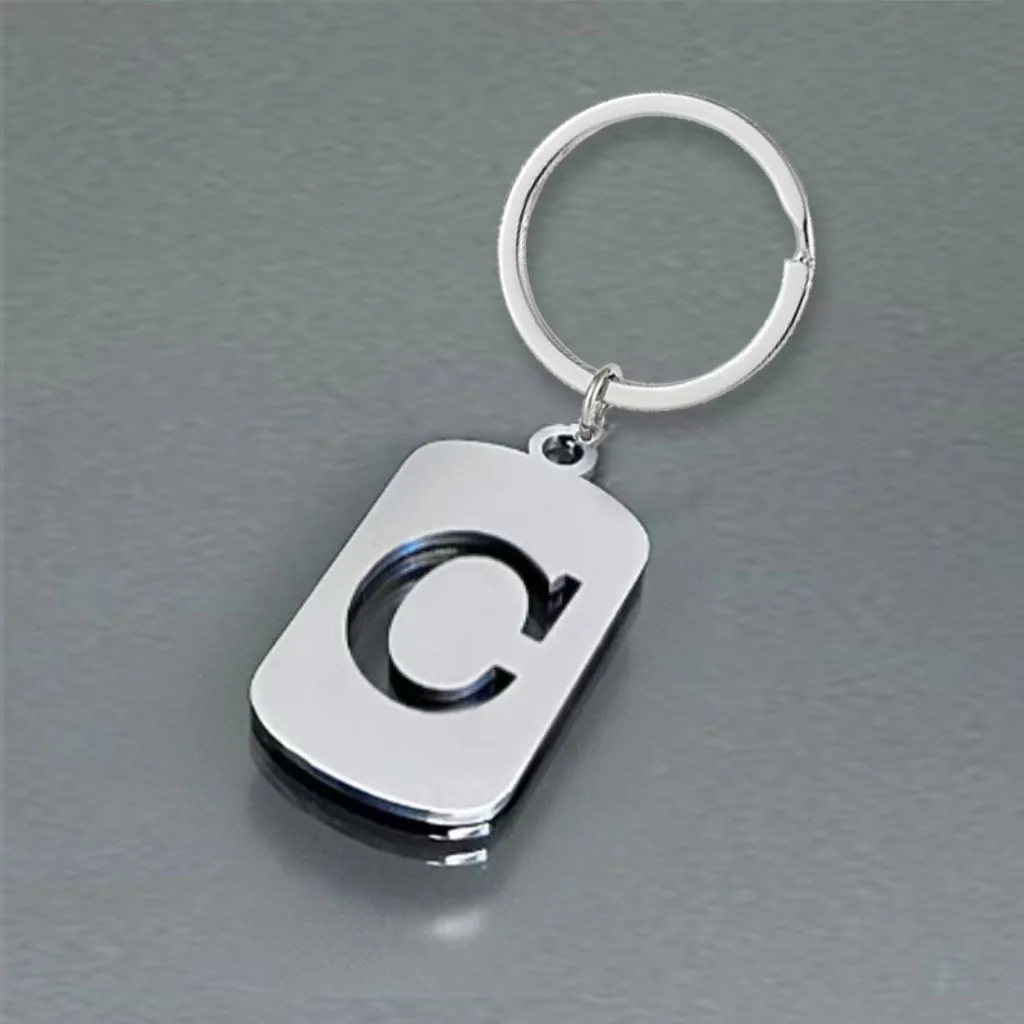 

New 26 Polished Hollow English Letter Stainless Steel Key Chain Simple And Personalized Backpack Car Pendant Key Ring