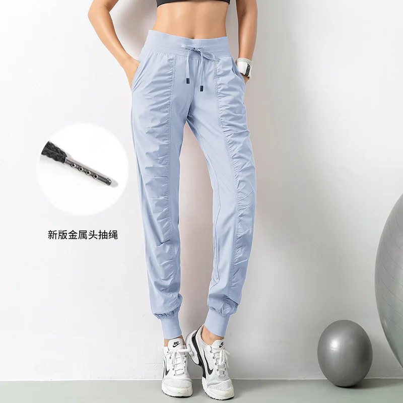 Pantaloni sportivi larghi per le donne pantaloni dimagranti ad asciugatura rapida leggings fitness da corsa casual pantaloni da yoga traspiranti set