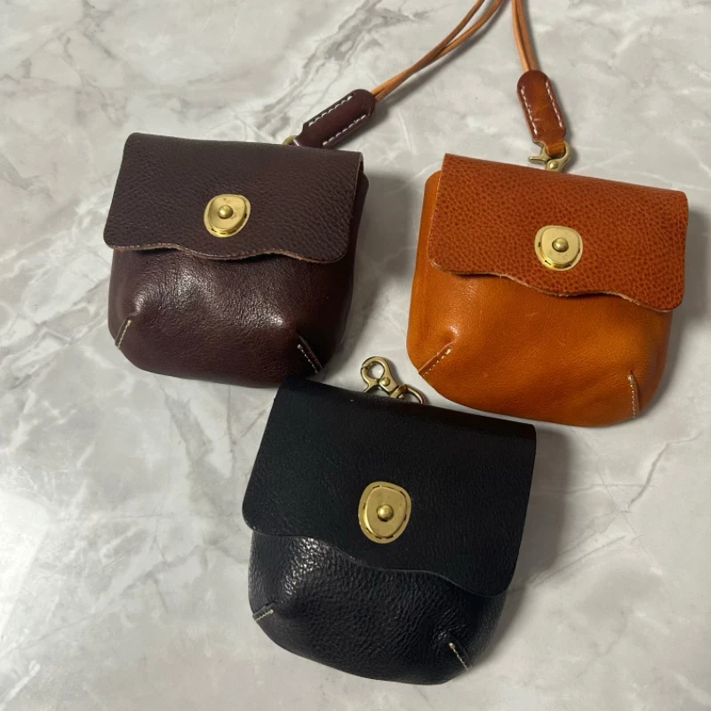 

Genuine leather solid color vintage handmade mini coin purse student purse men and women short top layer cowhide headphone case