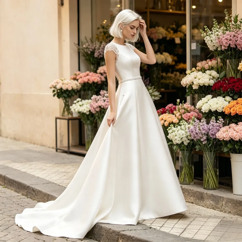 Customized 2026 minimalist satin A-line wedding dresses with backless short sleeves and ruffled edges, suitable for the beach