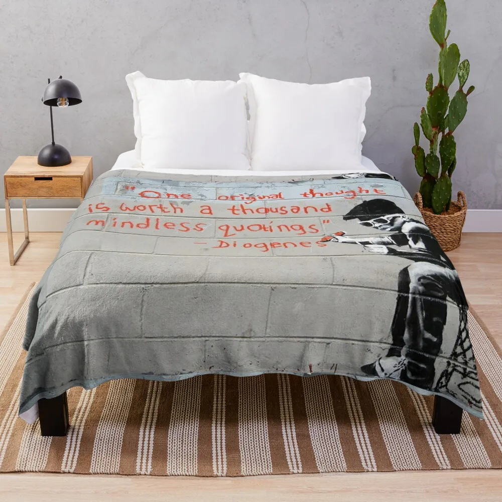 

Banksy street graffiti art One original thought is worth a thousand mindless quotings Diogenes Throw Blanket Single Blankets