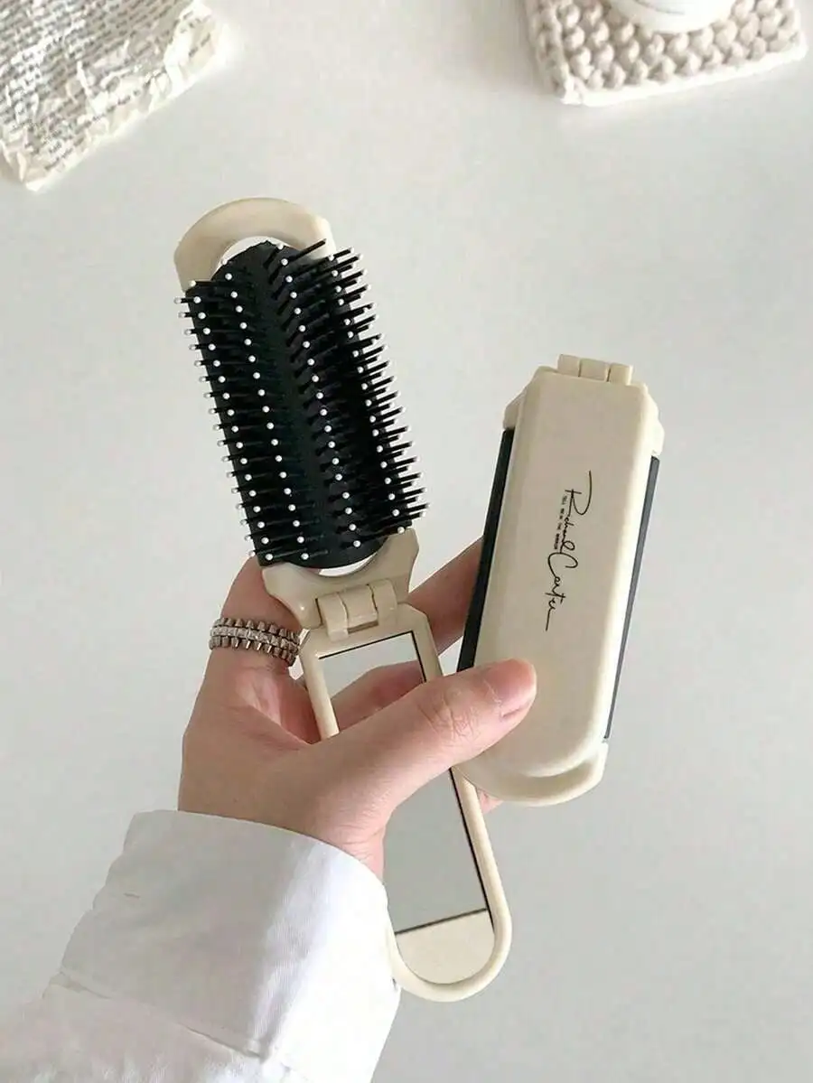 

1 foldable air cushion comb with mirror, portable travel comb, smooth hair to prevent tangling, essential for women's travel