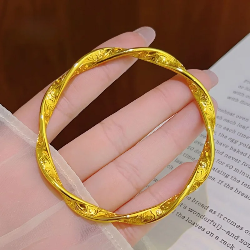 

New Chinese 999 Gold Bright Carved Mobius Bracelet 2026 New Twist Steamed Rolls Grass Grain 24k Color Bracelet