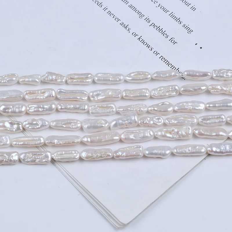 

Hot Sale 6-9mm Natural White Color Freshwater Biwa Pearl Strand Straight Drilled Hole