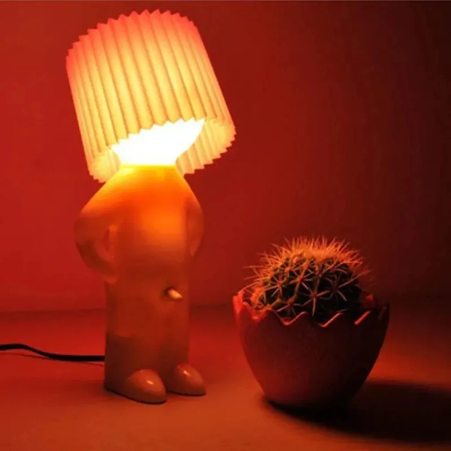 Add a touch of whimsy to your space with this cute, charming Naughty Boy Night Light Desk Lamp. Featuring a small, a little shy 