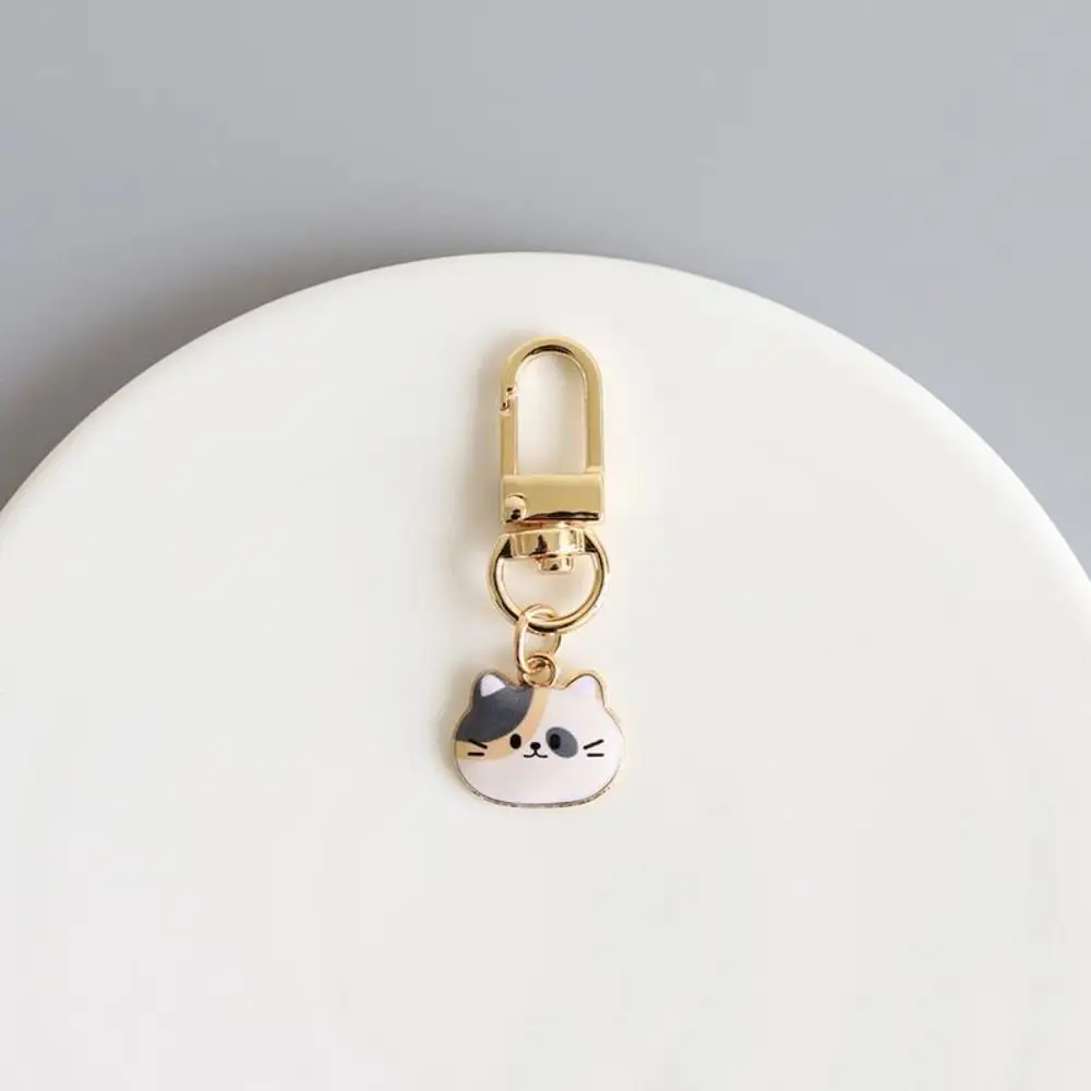 سلسلة مفاتيح إبداعية على شكل سماعة رأس للقطط ، قرص معدني يو ، قلادة حقيبة للأزواج